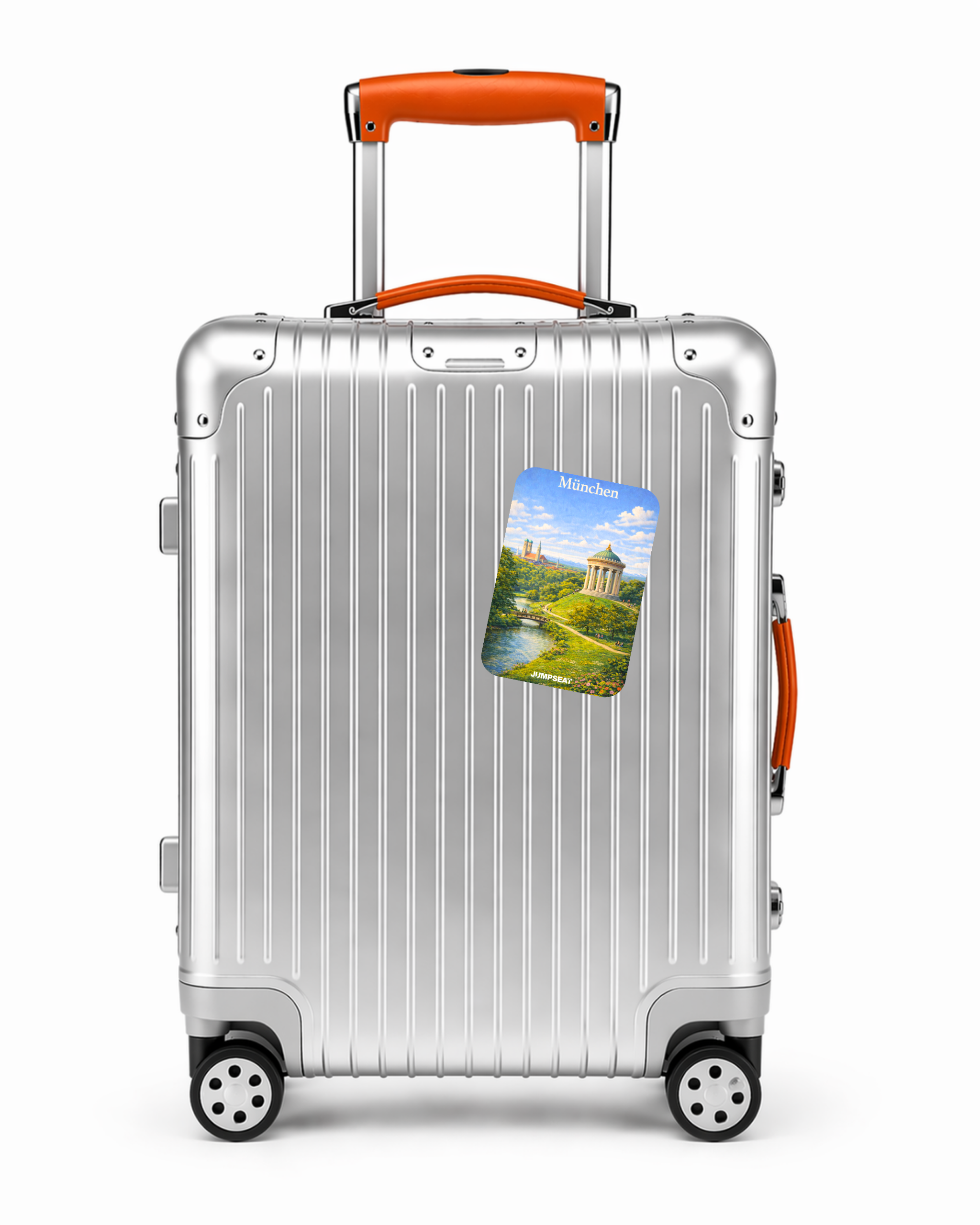 Silberner Reisekoffer mit München Reise-Sticker und orangenem Griff